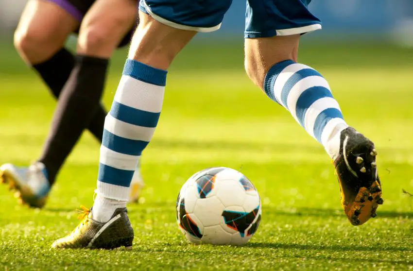 why do soccer players wear long socks